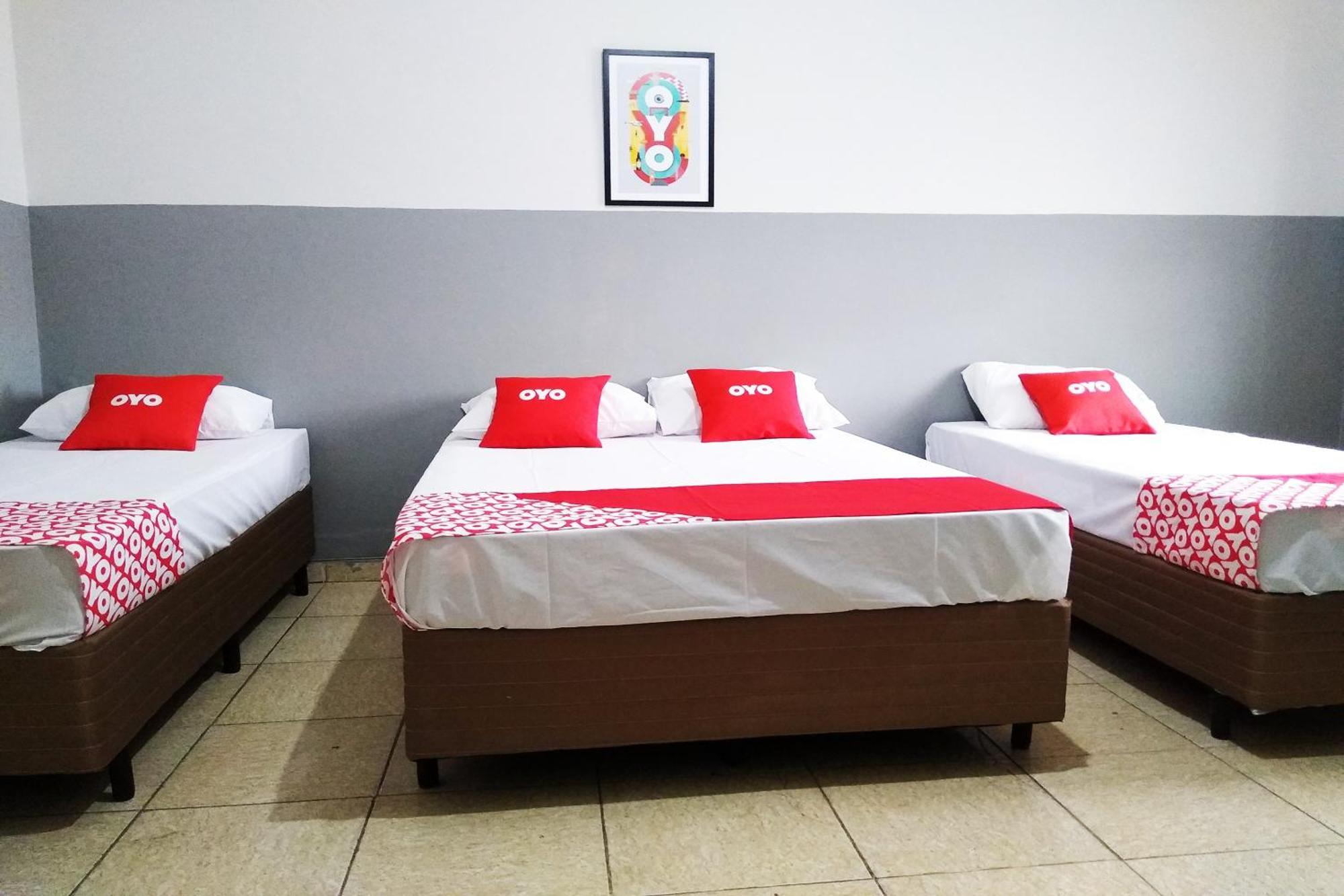Quarto Quíntuplo (1 Cama de Casal + 3 Camas de Solteiro)