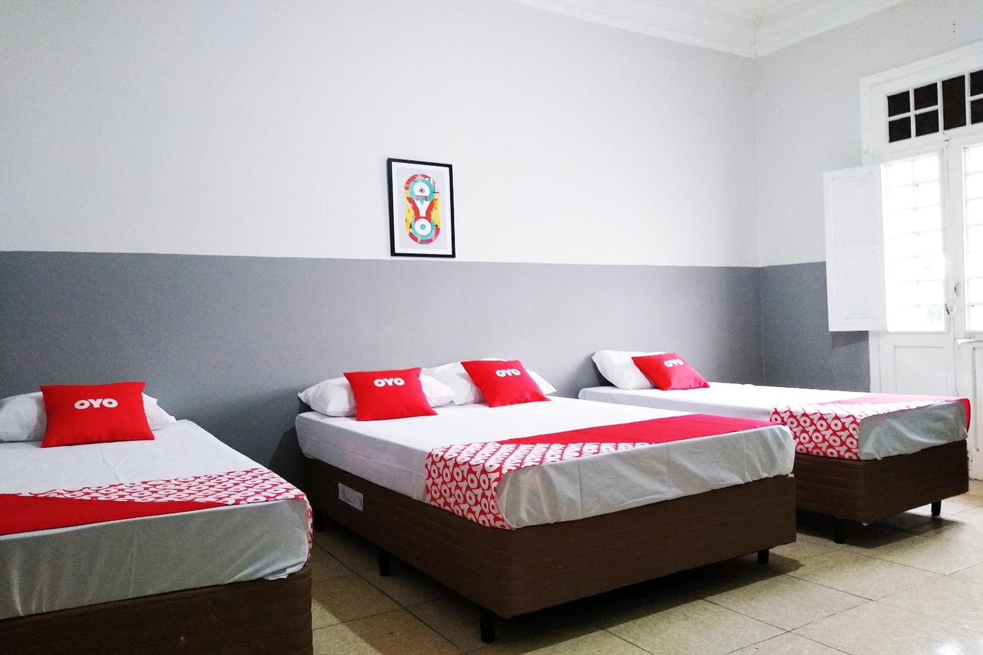 Quarto Quádruplo (1 Cama de Casal + 2 Camas de Solteiro)