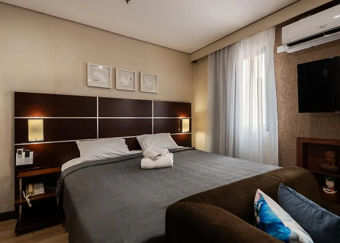 Unique Home 15min Cons USA - Smart TV e Sofá Cama
